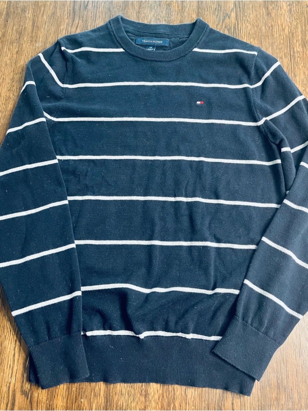 Classic Tommy Hilfiger navy striped crewneck sweater in men’s size small.
